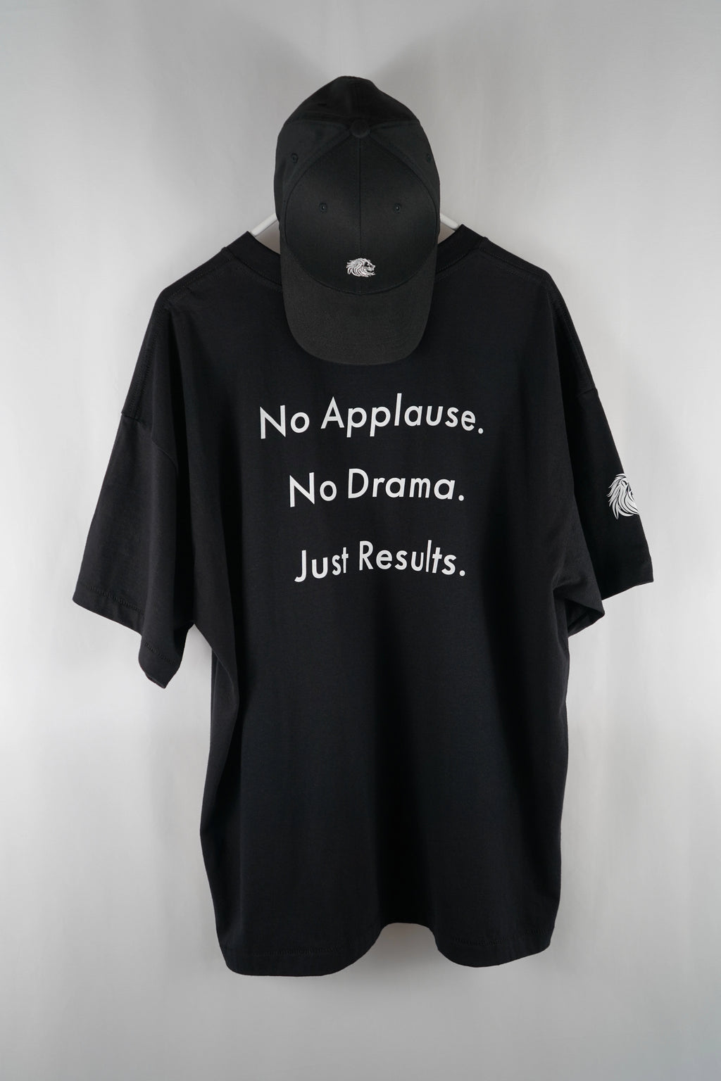  DL_Tee_Results_BackFull02
Alt-Text: Back of the Dunya Lions t-shirt showing full slogan: No Applause. No Drama. Just Results.
