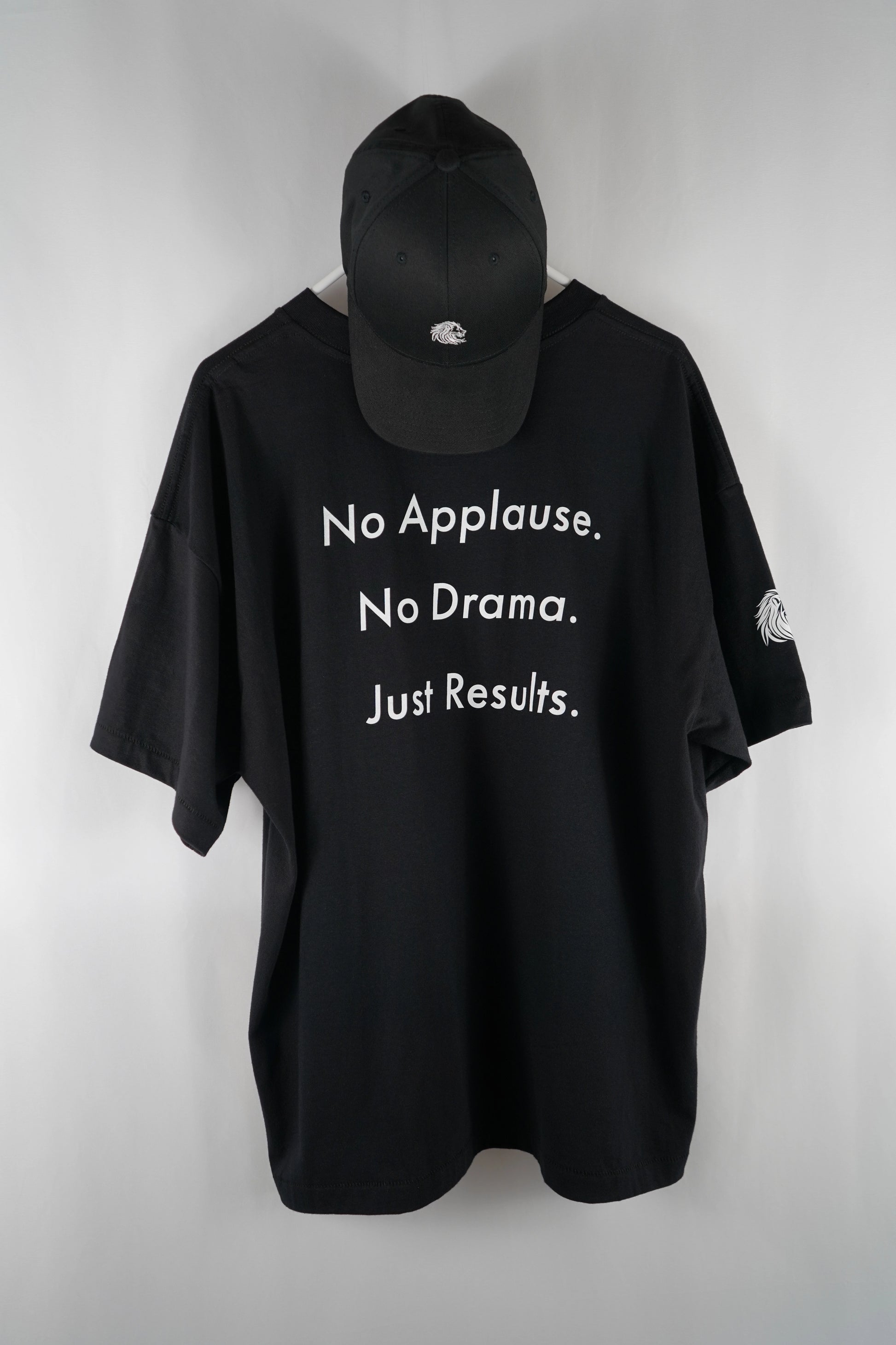  DL_Tee_Results_BackFull02
Alt-Text: Back of the Dunya Lions t-shirt showing full slogan: No Applause. No Drama. Just Results.